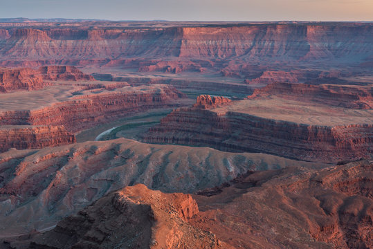 Sunset at Deadhorse Point State Park, view of Colorado river and Canyonlands National Park