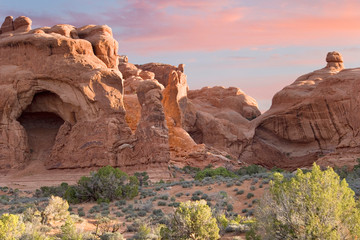 Fototapeta na wymiar USA, Utah, Arches National Park. View of the Windows Section and cave opening. 