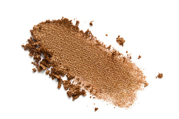 Bronzer or eyeshadow swatch. Crashed brown shimmer face powder texture. Nude eye shadow smudge isolated on white background - obrazy, fototapety, plakaty