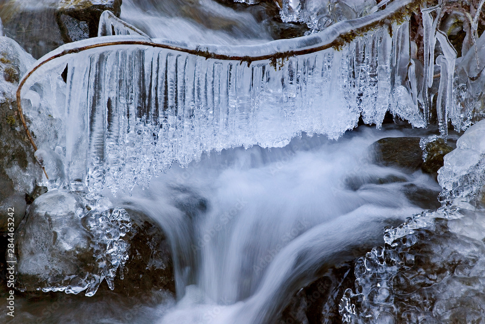 Sticker usa, washington, olympic national park. icy winter waterfall in dosewallips river valley.