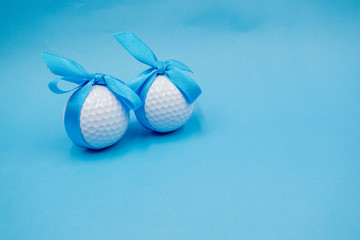 Golf balls are on blue background