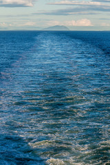 Obraz premium USA, Washington State. Wake from an AMHS ferry departing on the Inside Passage to Alaska