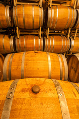 USA, Washington, Yakima Valley. Wine matures in the barrel room of an Eastern Washington winery.