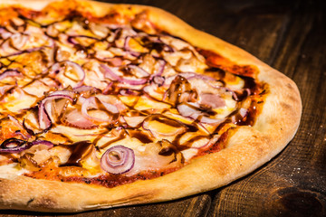 Fresh pizza made in a small bakery