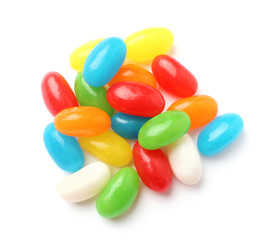 Pile of tasty bright jelly beans isolated on white, top view
