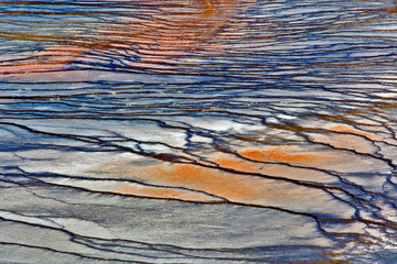 Fototapeta na wymiar Pattern in bacterial mat around perimeter of Grand Prismatic Spring, Midway Geyser Basin, Yellowstone National Park, Wyoming.