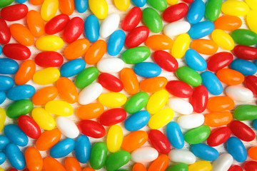 Delicious jelly beans of different colors, closeup