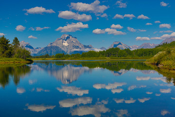 USA, Wyoming. Mt. Moran reflected in the Snake River, Grand Teton National Park Credit as: Jean Carter / Jaynes Gallery / DanitaDelimont.com