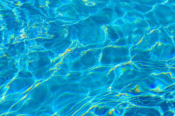 Fototapeta na wymiar Reflections and patterns of light in a swimming pool.