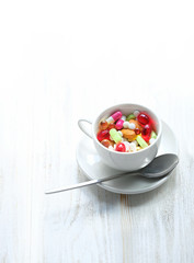 Different colorful medications pill close up. different drug and pill in Cup on white background. polypharmacy or multiple medication concept. copy space. shallow depth, soft selective focus