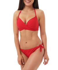Fototapeta premium Pretty sexy woman with slim body in stylish red bikini on white background, closeup view