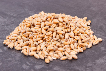 Heap of rye or wheat grains, agricultural concept
