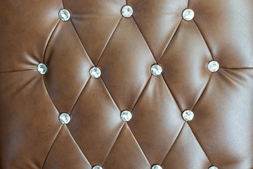 Luxurious Brown Leather sofa texture background.