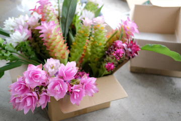 Fototapeta na wymiar siam tulip flower for arrangement in shop. florist workplace