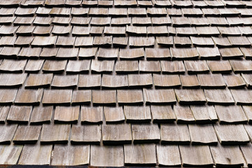 Background of Shingle aged wooden roof detail.
