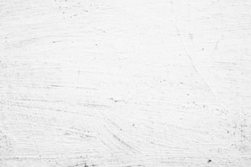 Texture of a concrete wall with cracks and scratches which can be used as a background