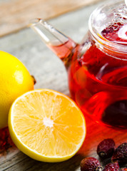 Fruit berry tea in the cup served on table