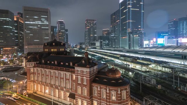 Tokyo Japan time lapse 4K, city skyline day to night timelapse at Tokyo Station