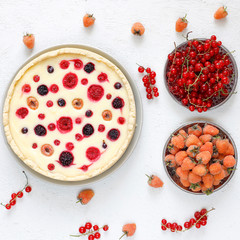 Homemade summer berry tar pie,different berries,golden raspberry,blackberry,red currant,raspberry,black currant,top view