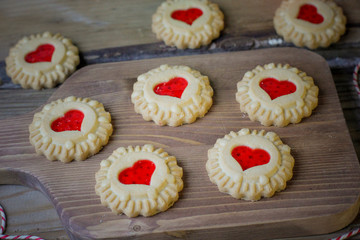 Heart shaped cookies for valentine's day on rustic background, top view, copy space