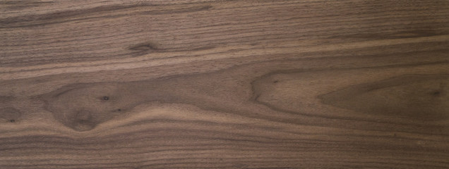 Black walnut wood texture of solid board untreated