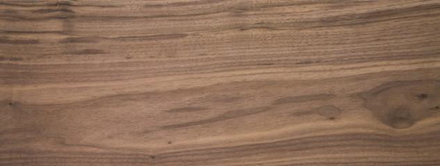 Black walnut wood texture of solid board untreated