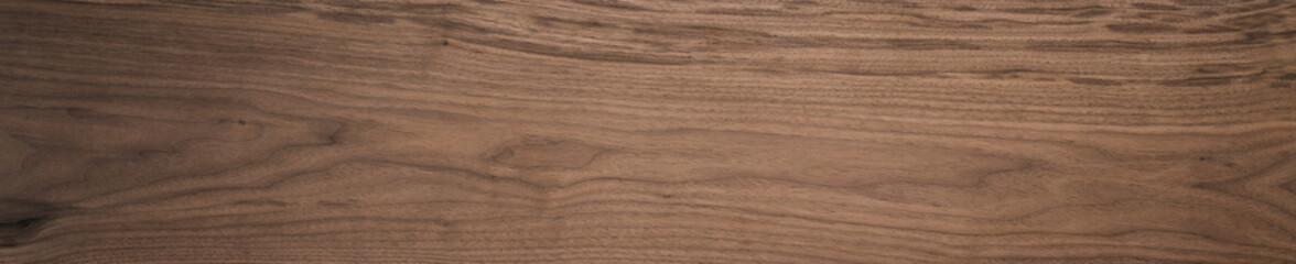 Black walnut wood texture of solid board untreated