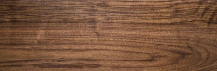Black walnut wood texture of solid board oil finished
