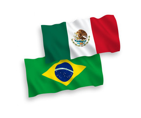 National vector fabric wave flags of Mexico and Brazil isolated on white background. 1 to 2 proportion.