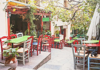 Fototapeta na wymiar Charming street in the old district of Plaka in Athens, Greece