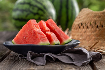 Closeup of juicy and tasty watermelon in summer garden