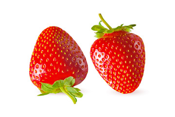 Macro isolated strawberry on a white background in different positions. Retouched strawberry on white background.