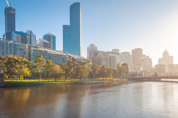 Fototapeta na wymiar Melbourne cityscape with sunset sunshine at autumn