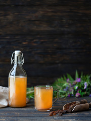 kvass made of sourdough in a cup and a bottle