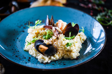 risotto with fresh seafood & shrimps, shells, octopus, calamari 