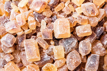 Cane sugar in crystal cubes, fragrant brown sugar for tea and coffee
