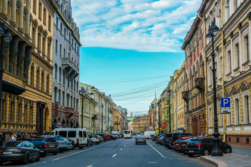 Fototapeta na wymiar Saint-Petrsburg, Russia - August, 14, 2019: cars parking on the street in a center of Saint-Petrsburg, Russia