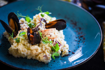 risotto with fresh seafood & shrimps, shells, octopus, calamari 