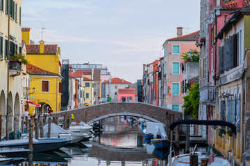 Fototapeta na wymiar Chioggia, Italy - July, 16, 2019: Landscape with the image of channel in Chioggia, Italy