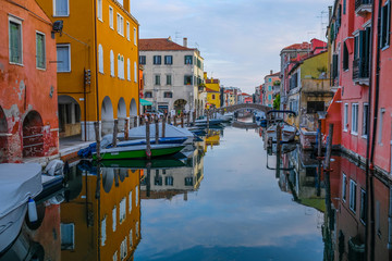 Fototapeta na wymiar Chioggia, Italy - July, 16, 2019: Landscape with the image of channel in Chioggia, Italy