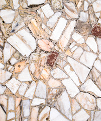 Texture background of stone floor. Pieces of marble in cement.