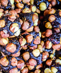 Slices of marmalade with hazelnuts. Hazelnut with sweets.