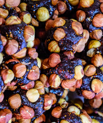 Slices of marmalade with hazelnuts. Hazelnut with sweets.