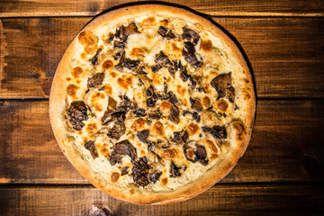 Fresh pizza made in a small bakery