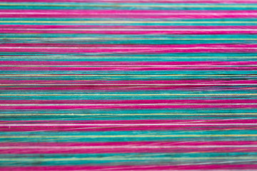 Line of cotton threads background texture