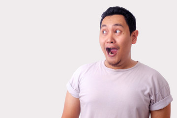 Obraz premium Man Shocked to See Something on his Side, Excited Gesture with Copy Space