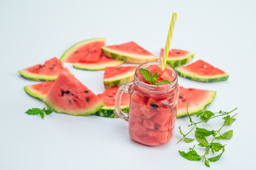 Summer Watermelon drink in glasses and slices of watermelon