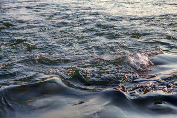 background of river water surface with little waves