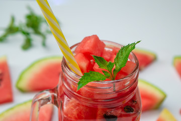 Summer Watermelon drink in glass and slices of watermelon 