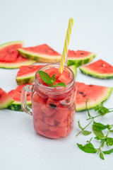 Summer Watermelon drink in glasses and slices of watermelon